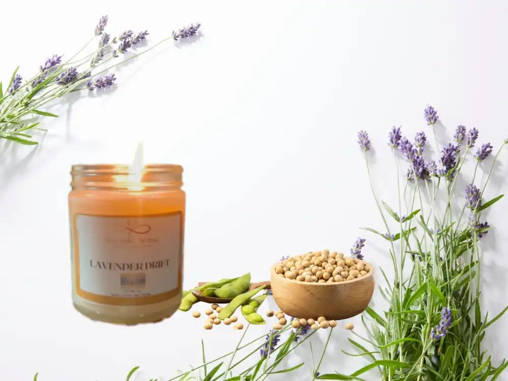 A lit candle in a glass jar.