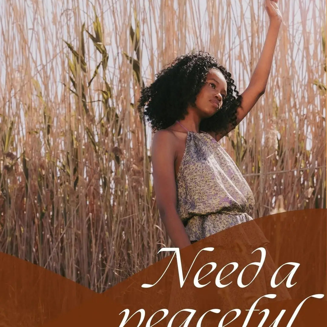 Person with curly hair joyfully dancing among reeds, embodying relaxation techniques with natural soy wax.