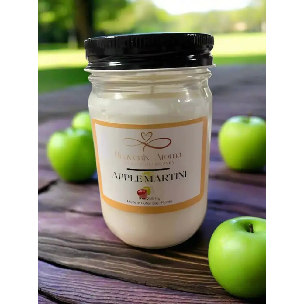 White candle in a mason jar with Apple Martini fragrance label for cozy relaxation.