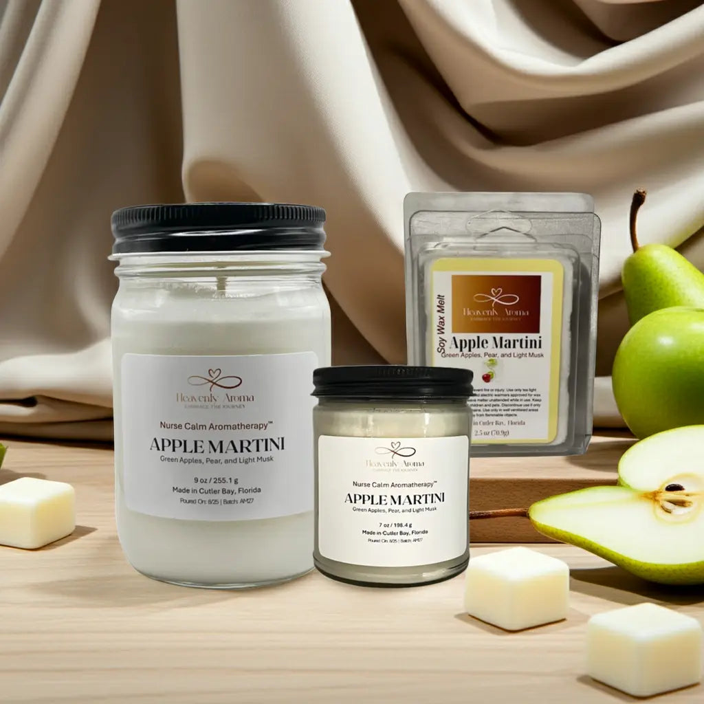 Two jars of 'Apple Martini' candles with packaging and pears on a wooden surface.