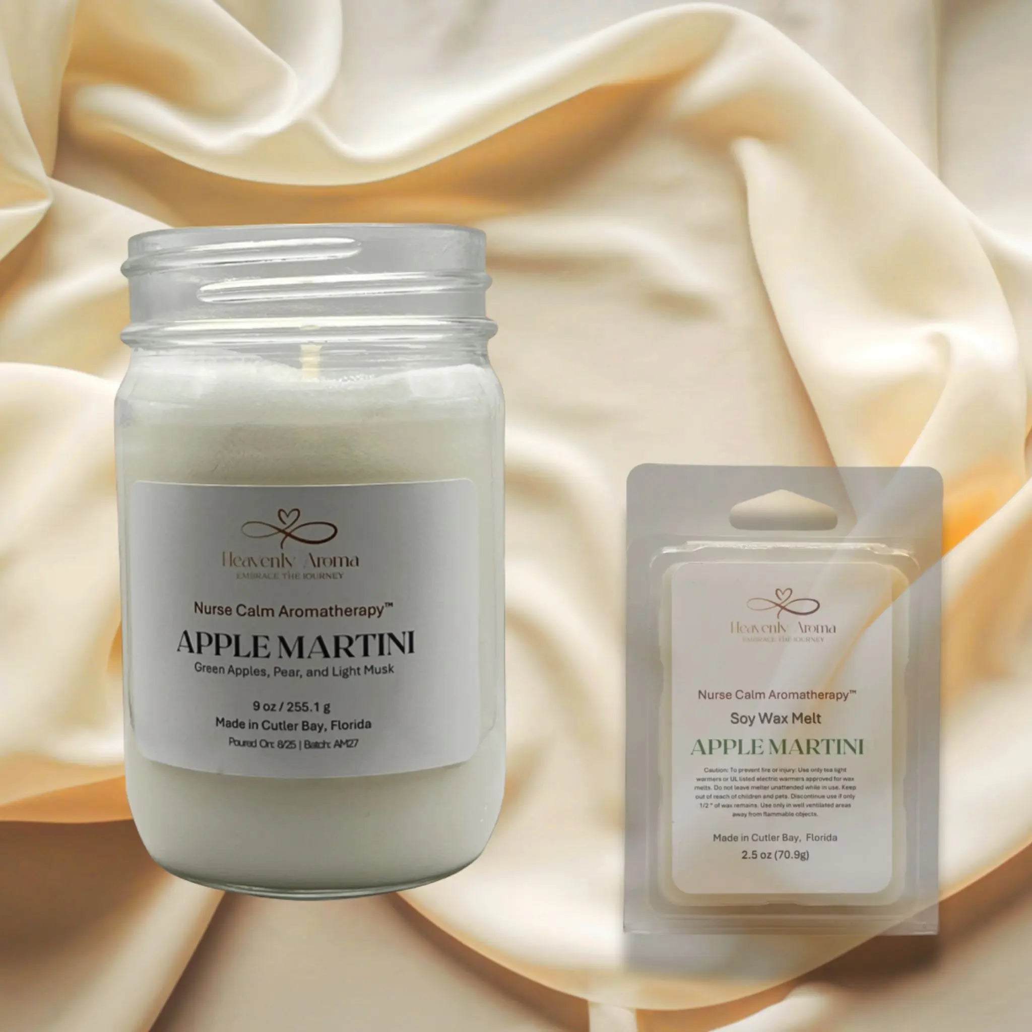 Apple Martini candle and wax melt packaging on a beige fabric background
