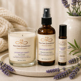 Close-up of the Calm Reset Ritual bundle featuring Lavender Drift candle, Lavender Elixir Room & Linen Spray, and Lavender Elixir Essential Oil Roller.