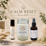 Calm Reset bundle with candles, essential oil bottles, and lavender on a neutral background