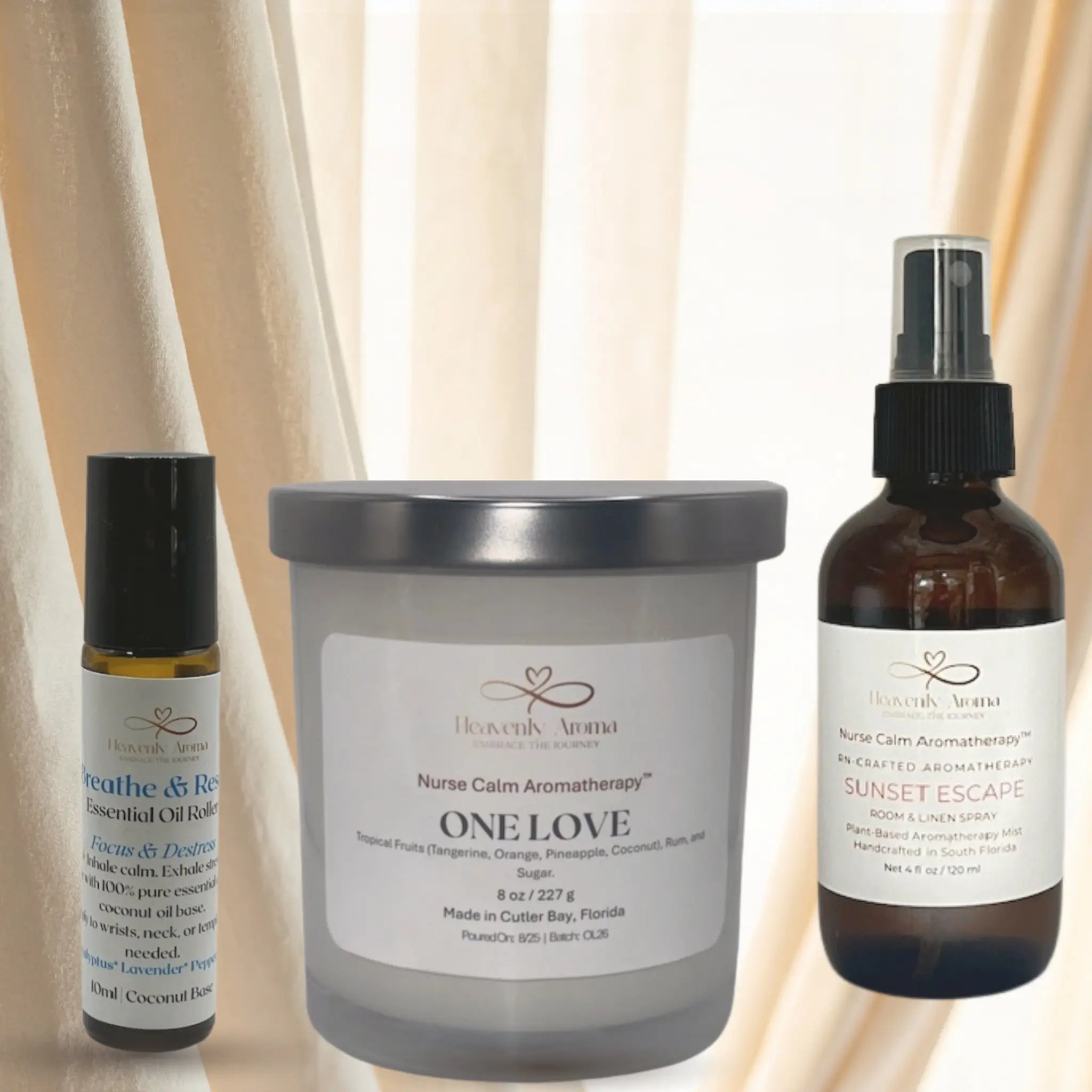 Three Aromatherapy products including a candle, roller bottle, and spray bottle on a neutral background.