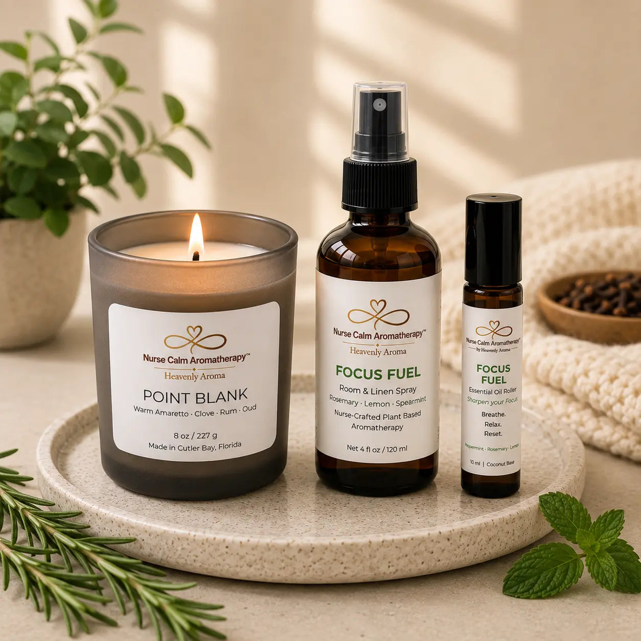 Focus & Energy Ritual wellness bundle featuring Point Blank soy candle, Focus Fuel Room & Linen Spray, and Focus Fuel Essential Oil Roller by Nurse Calm Aromatherapy.