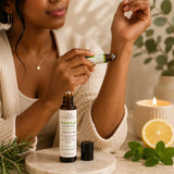 Person applying Focus Fuel Essential Oil Roller to the wrist before work for natural focus and mental clarity.
