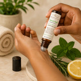 Applying Focus Fuel essential oil roller to the wrist for focus and mental clarity.