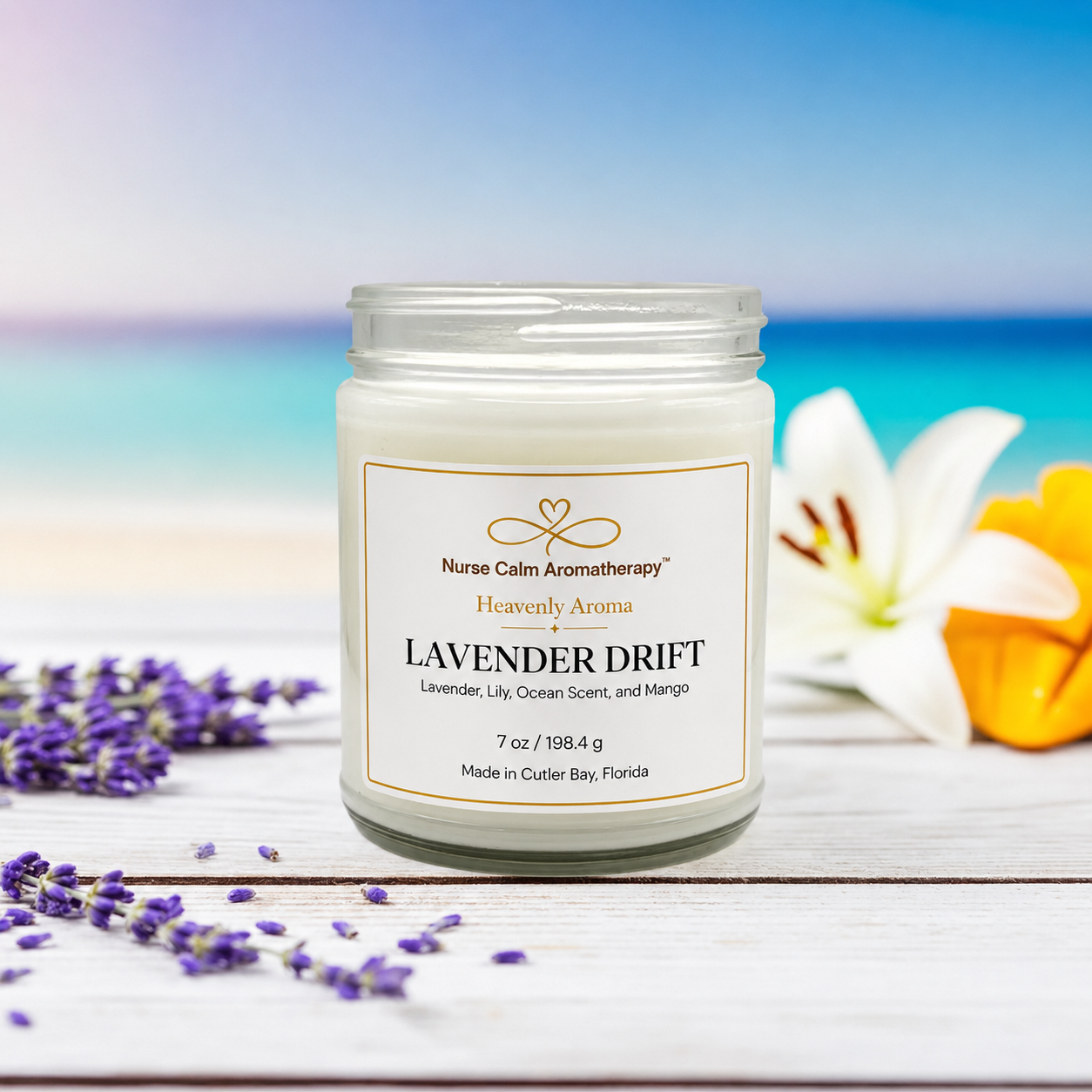 Candle jar labeled 'Lavender Drift' with lavender and flowers on a blurred beach background