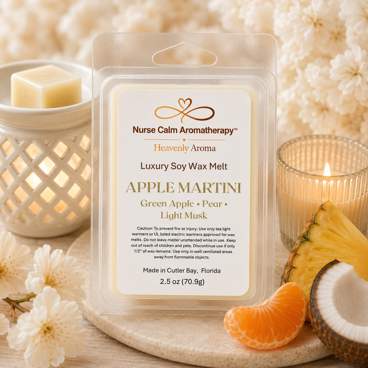 Nurse Calm Aromatherapy Apple Martini soy wax melt packaging with candles and fruit on a wooden surface.