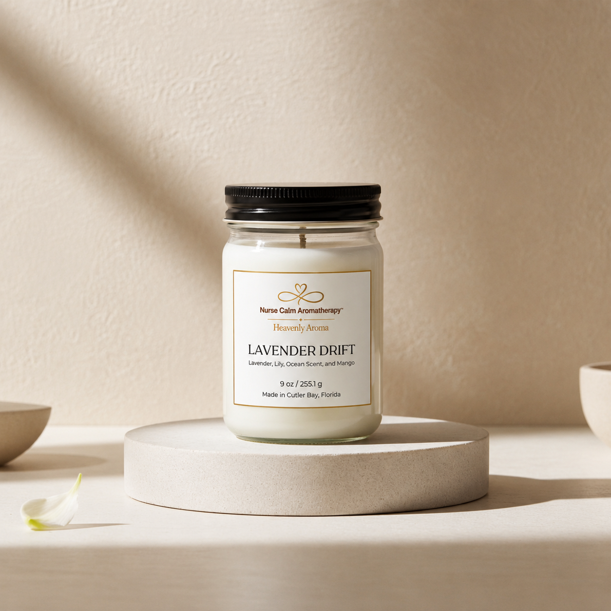 Candle jar labeled 'Lavender Drift' on a neutral background