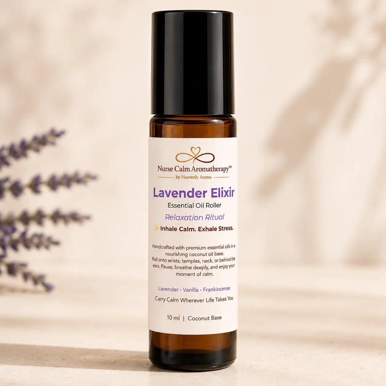 Close-up of Lavender Elixir Essential Oil Roller featuring lavender, vanilla and frankincense in a 10 ml amber glass bottle.