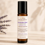 Close-up of Lavender Elixir Essential Oil Roller featuring lavender, vanilla and frankincense in a 10 ml amber glass bottle.