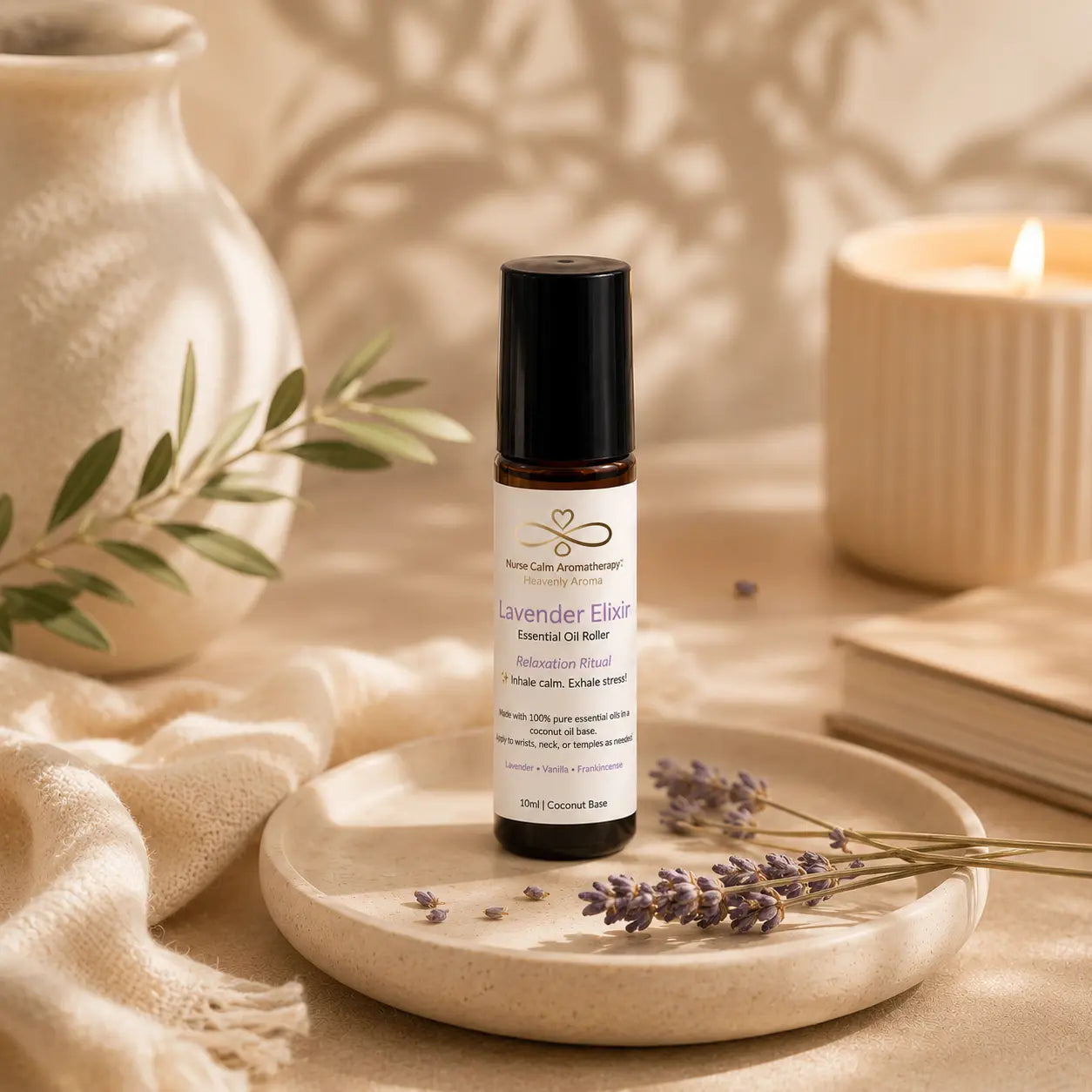 Lavender essential oil roller bottle on a wooden surface with lavender flowers and a candle in the background.