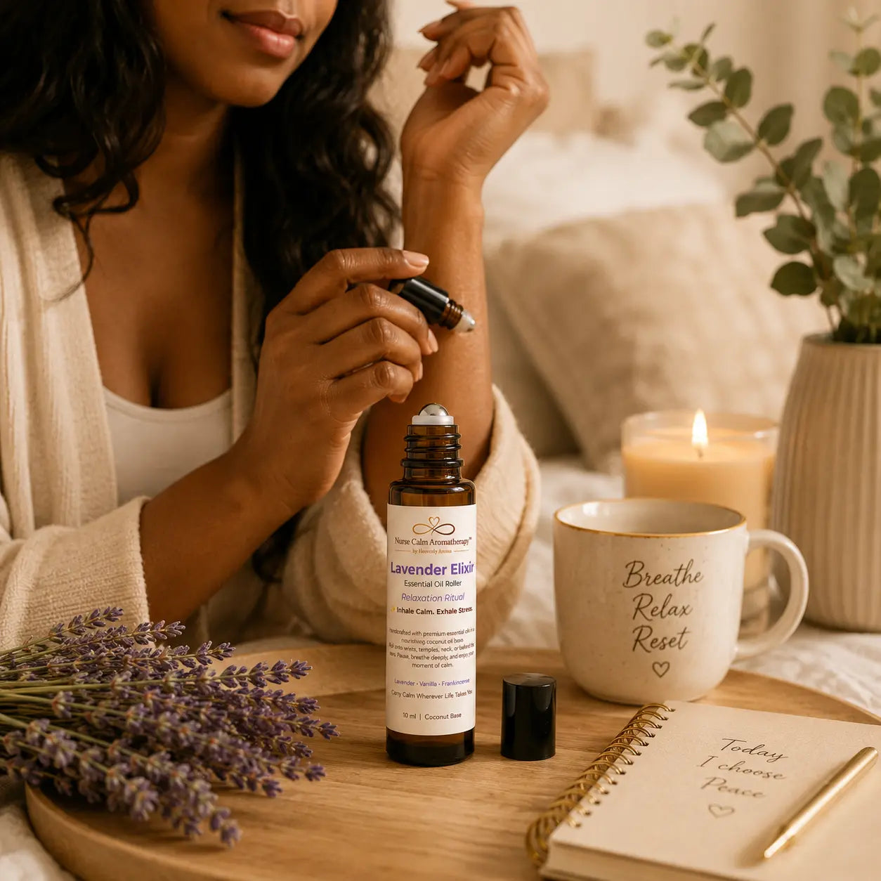 Lavender Elixir Essential Oil Roller beside cozy wellness essentials creating a peaceful self-care environment.