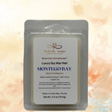Montego Bay luxury soy wax melt packaging with a soft peach background