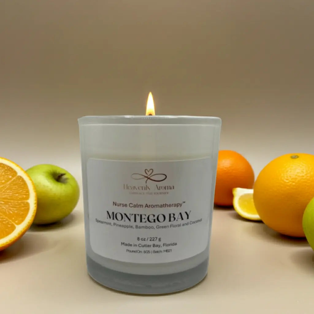Candle labeled 'Montego Bay' with fruits on a neutral background