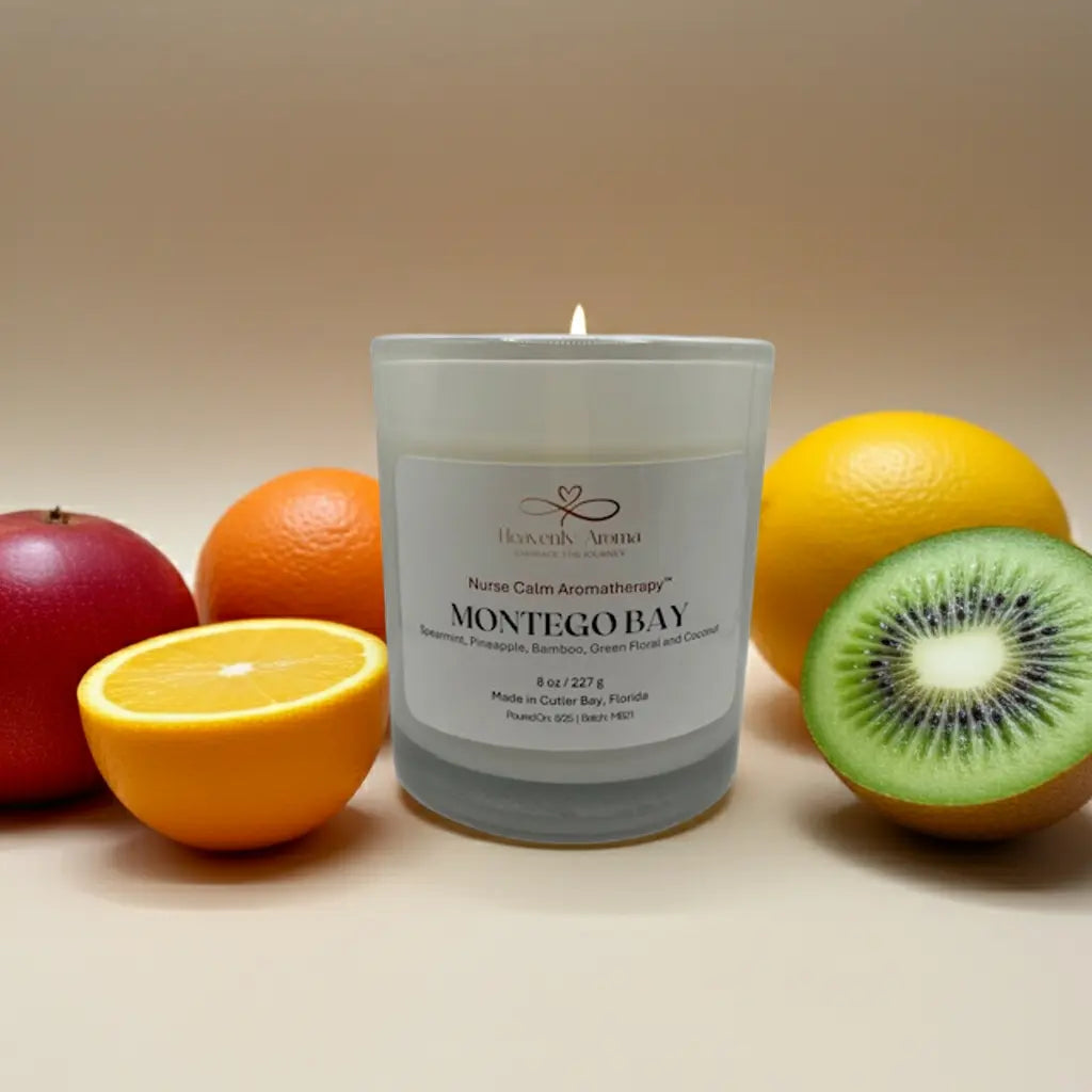 Candle labeled 'Montego Bay' surrounded by fruits on a beige background