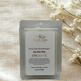 Soy wax melt packaging labeled 'Nurse Calm Aromatherapy' by Heavenly Aroma on a textured fabric background with white flowers.