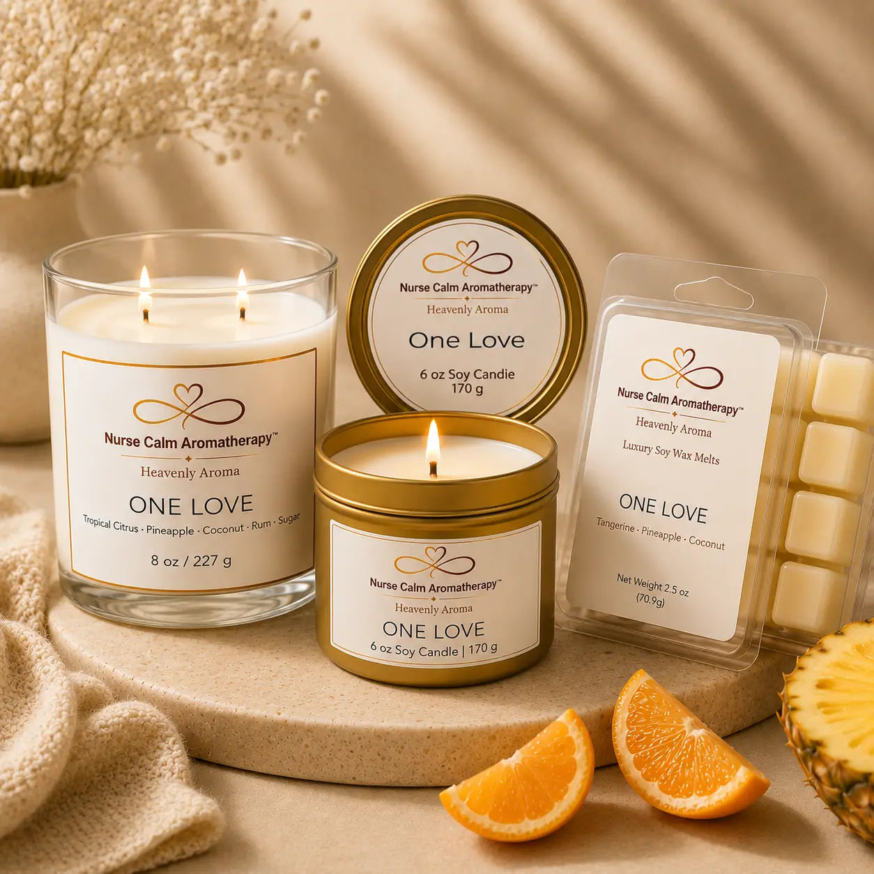 Close-up of the One Love Coastal Luxe bundle showcasing handcrafted soy candles and wax melt with warm tropical citrus, pineapple, coconut, rum, and sugar fragrance notes.