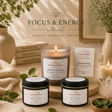 Aromatherapy products including candles and diffusers on a wooden surface with 'Focus & Energy' text in the background.