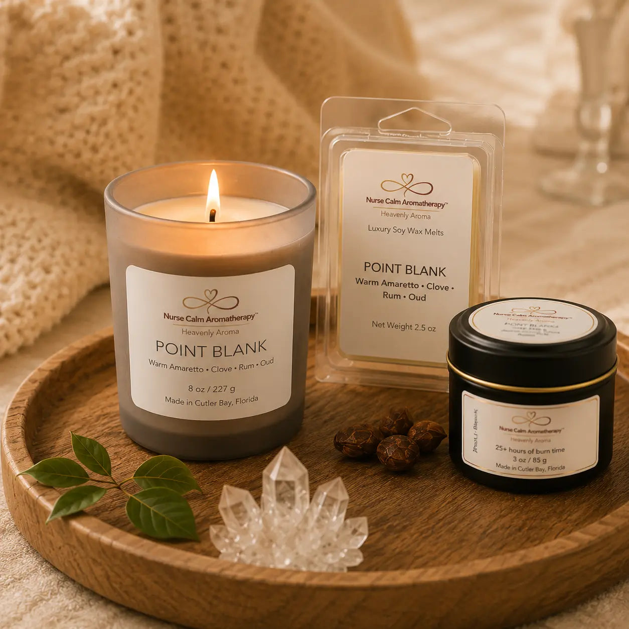 Point Blank Mini Power Set featuring an 8 oz luxury soy candle, 3 oz travel candle, and Point Blank wax melt in a warm spa-inspired setting.