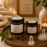 Point Blank Travel & Glow Duo featuring 3 oz and 6 oz luxury soy travel candles in elegant black tins with cream labels.