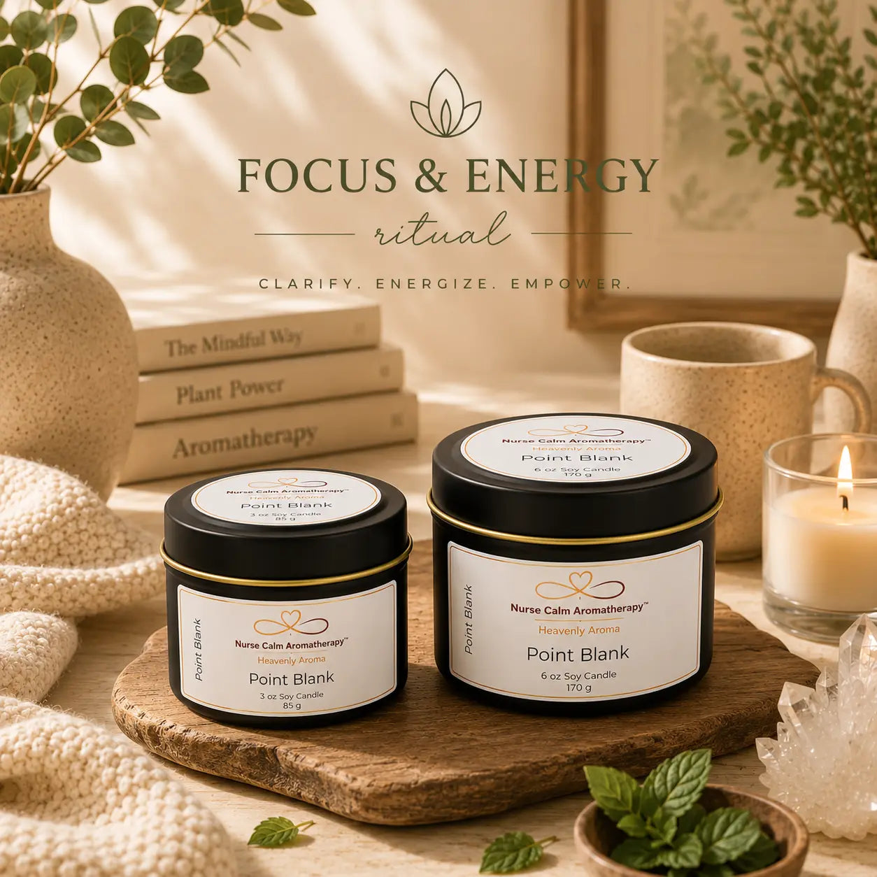 Two candles labeled 'Point Blank' on a wooden tray with a serene setting.