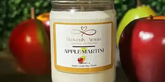 Apple martini candle jar with black lid and white label.