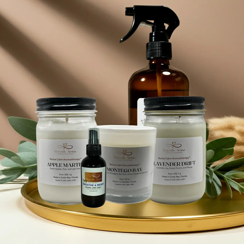 Collection of natural products including candles and a spray bottle on a gold tray with a neutral background.